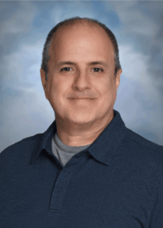 Staff portrait of a Springs Charter Schools team member.