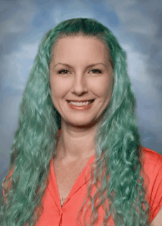 Staff portrait of a Springs Charter Schools team member.