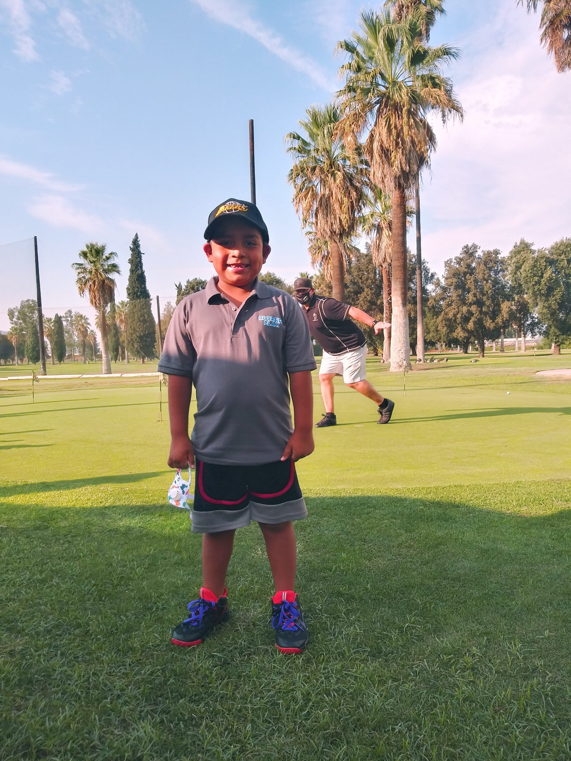 Magnolia Student Learns Golf through PLAY - Springs Charter Schools