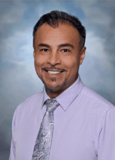 Staff portrait of a Springs Charter Schools team member.