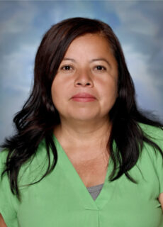 Professional staff portrait of a Springs Charter Schools team member in business attire.