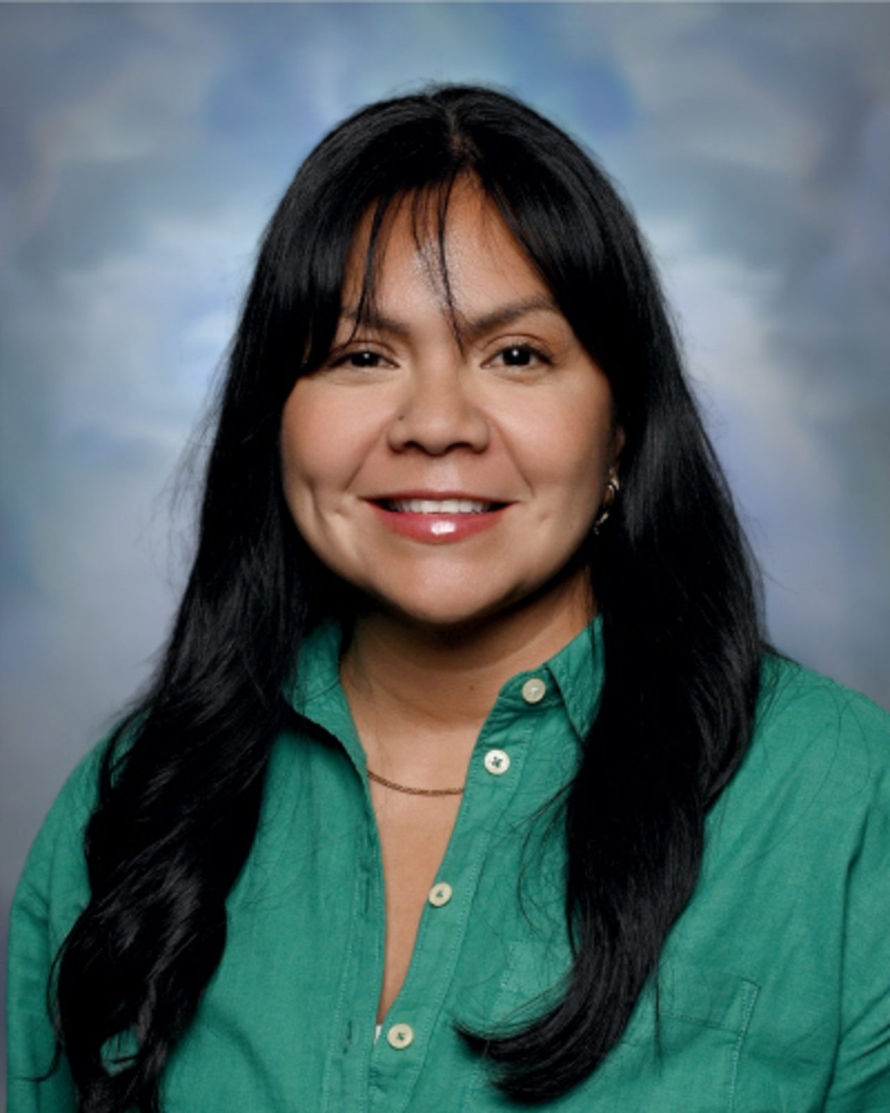 Staff portrait of a Springs Charter Schools team member.
