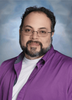 Staff portrait of a Springs Charter Schools team member.