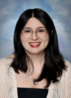 Professional staff portrait of a Springs Charter Schools team member in business attire.