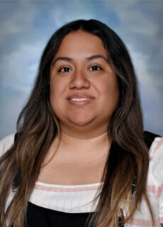 Professional staff portrait of a Springs Charter Schools team member in business attire.
