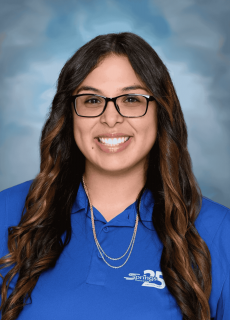 Professional headshot of a smiling employee against a neutral background.