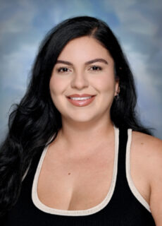 Professional staff portrait of a Springs Charter Schools team member in business attire.