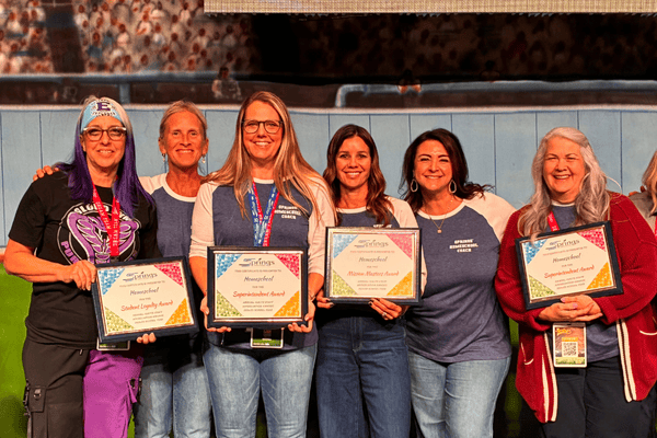 Homeschool leaders being recognized at a staff development day.