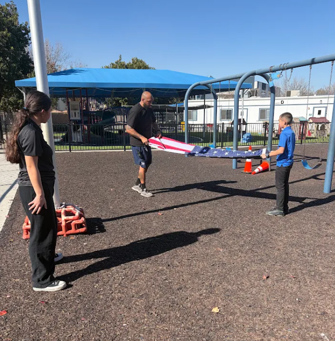 Students Assisting with Campus Flag Ceremony | Springs Charter Schools