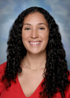 Professional staff portrait of a Springs Charter Schools team member in business attire.