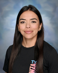 Professional staff portrait of a Springs Charter Schools team member in business attire.