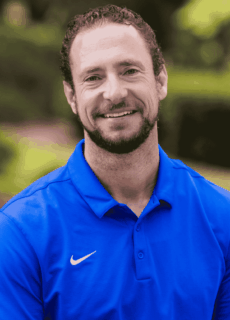 Professional staff portrait of a Springs Charter Schools team member in business attire.
