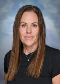 Staff portrait of a Springs Charter Schools team member.