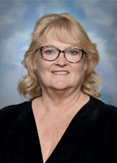 Staff portrait of a Springs Charter Schools team member.