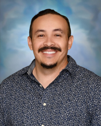 Staff portrait of a Springs Charter Schools team member.